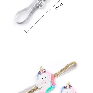Detail of 19cm baby headbands featuring glitter heart and colorful unicorn embroidery
