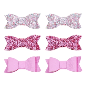 Detailed set of 6 bow hair clips featuring glitter sequins and litchi textured leather