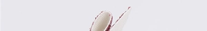 Detailed close-up of handmade bow hair clip with burgundy sequins and cream woven fabric