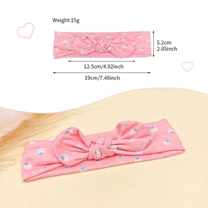 Détails du bandeau rose pour bébé avec motif de fraises et les dimensions précises