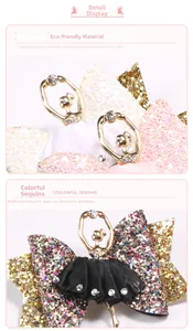 Détail d'une pince à cheveux ballerine avec paillettes, strass et ruban de satin