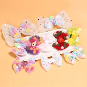 Set of 11 colorful bow hair clips with unicorn and pompom mesh details for girls