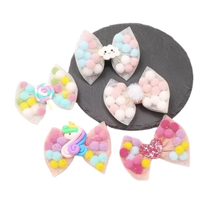 Cute set of 5 tulle bow hair clips with unicorn and lollipop charms for little girls
