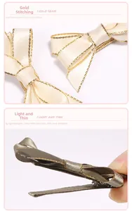 Detail view of lightweight fabric bow hair clips with elegant gold thread stitched edges