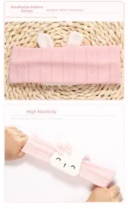 Breathable pink lace baby headband with rabbit ears showing high elasticity and stretch