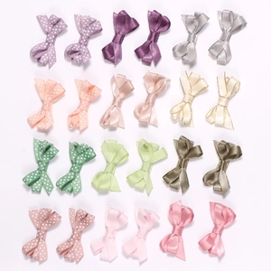24-piece set of colorful ribbon hair clips for kids with dots and solid textures