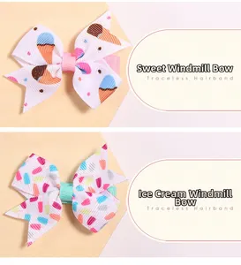 Détail de barrettes nœuds papillon avec motifs de glaces et cornets pour enfants