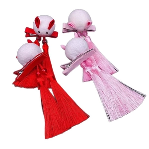 Traditional Chinese rabbit tassel hair clips for girls in red and pink styles