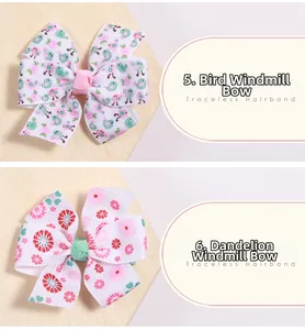 Détail de barrettes moulin à vent avec motifs oiseaux et pissenlits en tissu doux