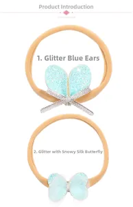 Detail of glitter blue ears and chiffon butterfly patterns on nude baby headbands