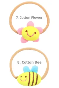 Detailed view of plush stuffed flower and bee hair bands for toddlers on elastic cord