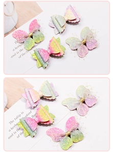 Detail of glitter hair clips with gradient tulle butterfly and sequin bow for girls