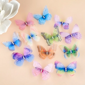 Détails de 12 pinces à cheveux papillon en organza coloré avec accents de cristal blanc