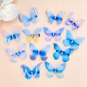 Détails des barrettes papillon en tulle dégradé avec strass pour coiffure féerique