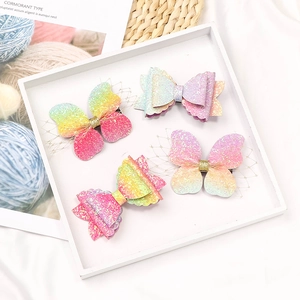 Glittery gradient butterfly and bow hair clips set for girls in rainbow pastel colors
