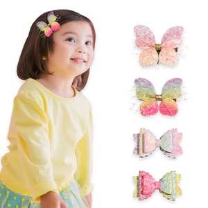Children's glitter gradient butterfly hair clips set for girls shown on a model