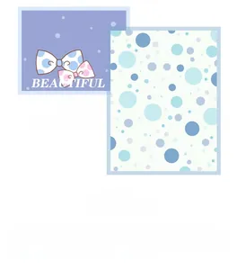 Detail of colorful mesh bow hair clip with polka dot pattern and princess design