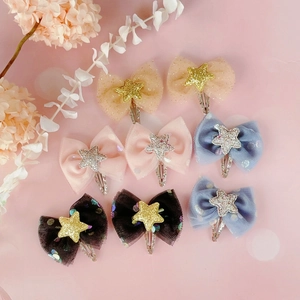 Set of 8 polka dot mesh bow hair clips with glitter stars for girls and kids