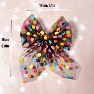 Close-up of a 13cm mesh bow hair clip with colorful polka dots and size measurements