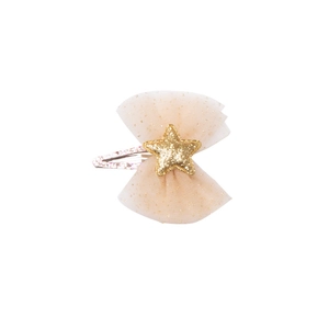 Detailed view of apricot mesh bow hair clip with gold glitter star and metallic BB clip