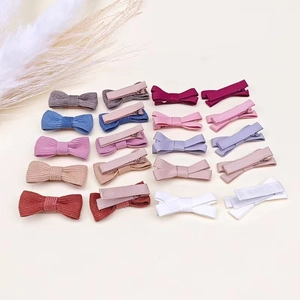 Linen and satin bow hair clips set for babies and kids in multiple vibrant colors