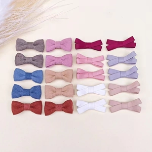 Bulk set of 20 linen and ribbed cotton bow hair clips in various pastel colors