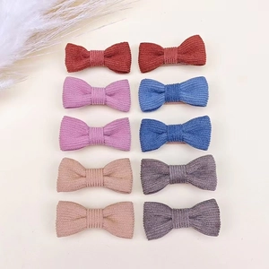 Detailed set of 10 corduroy bow hair clips in various Morandi colors for babies and kids