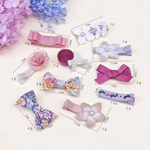 Floral hair clip set with grosgrain ribbon bows and lace embroidery for girls