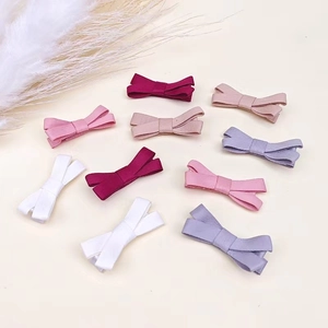 Detailed arrangement of linen bow hair clips with silver metal crocodile clips for girls