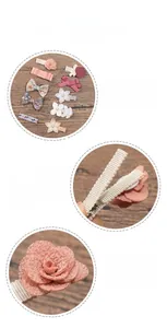 Detail view of fabric-wrapped safety hair clips with floral bows for baby girls