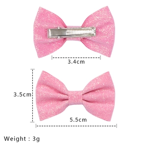 Dettagli del fiocco per capelli rosa glitterato con misure della clip a becco d'anatra