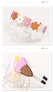 Detailed embroidery of ice cream and glitter flowers on fabric headbands for kids