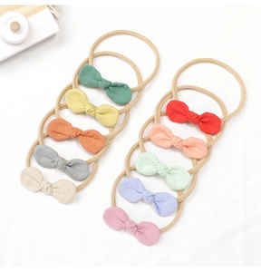 Lot de 10 bandeaux bébé avec nœud en coton et lin et élastiques en nylon en couleurs variées