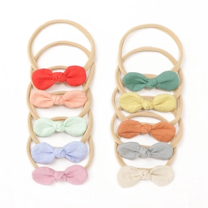 Lot de 10 bandeaux bébé avec nœuds en lin colorés et sangles en nylon élastique doux