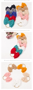 Detail of baby elastic nylon headband featuring textured knit double-layered bow