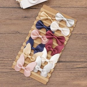 10er-Set Baby-Haarbänder aus Nylon mit metallisch texturierten Schmetterlingsschleifen