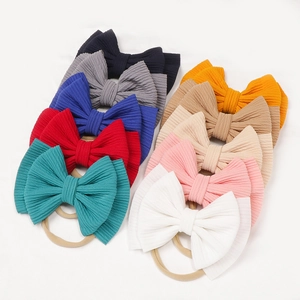 10-piece set of baby girl ribbed bow headbands with elastic nylon bands in assorted colors