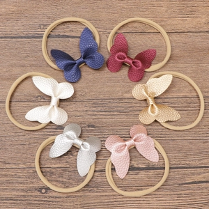 6-teiliges Baby-Nylon-Stirnband-Set mit strukturierten Kunstleder-Schleifen in Farben