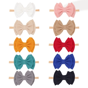 Set of 10 elastic baby headbands with ribbed double-layered bows in assorted colors