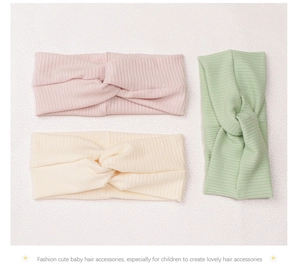 Three-piece set of ribbed knit twist headbands for infants in pink, beige, and mint green