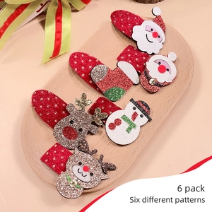 Détail du lot de 6 barrettes de Noël avec paillettes et motifs de fête variés