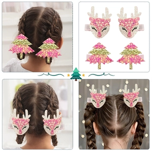 Détails de pinces à cheveux avec bois de renne pailletés et sapin de Noël