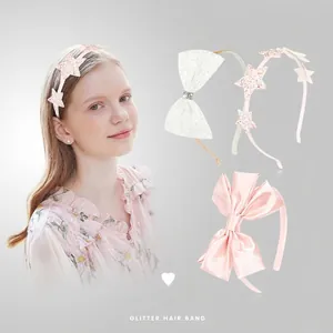 Kids hair band set featuring glitter stars, white mesh bow, and pink satin bow styles
