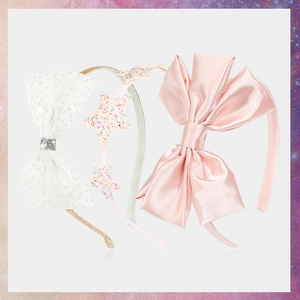 Three-piece girls' headband set with pink satin bow, glitter stars, and tulle details