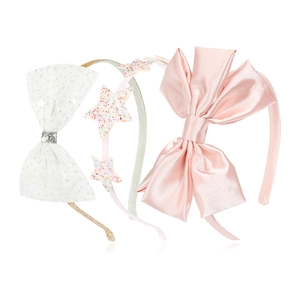 Three-piece girls' headband set with glitter stars, pink satin bow, and white mesh lace bows
