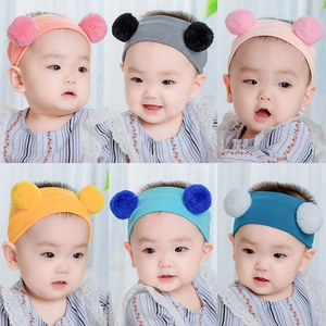 Elastisches Baby Stirnband mit Bommeln in sechs Farben wie Grau Rosa und Blau