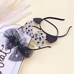 Three-piece Halloween headband set with black mesh bow, star sequins, and sequined cat ears