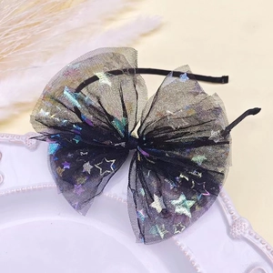 Elegant black mesh headband with iridescent stars and large bow for girls and women