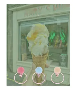 Detail of plush pom pom hair ties with sequined ice cream cone design in pastel colors