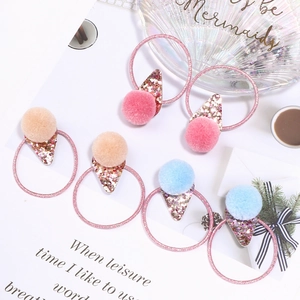 Ice cream pom pom hair ties with star sequins for kids in pink and blue colors